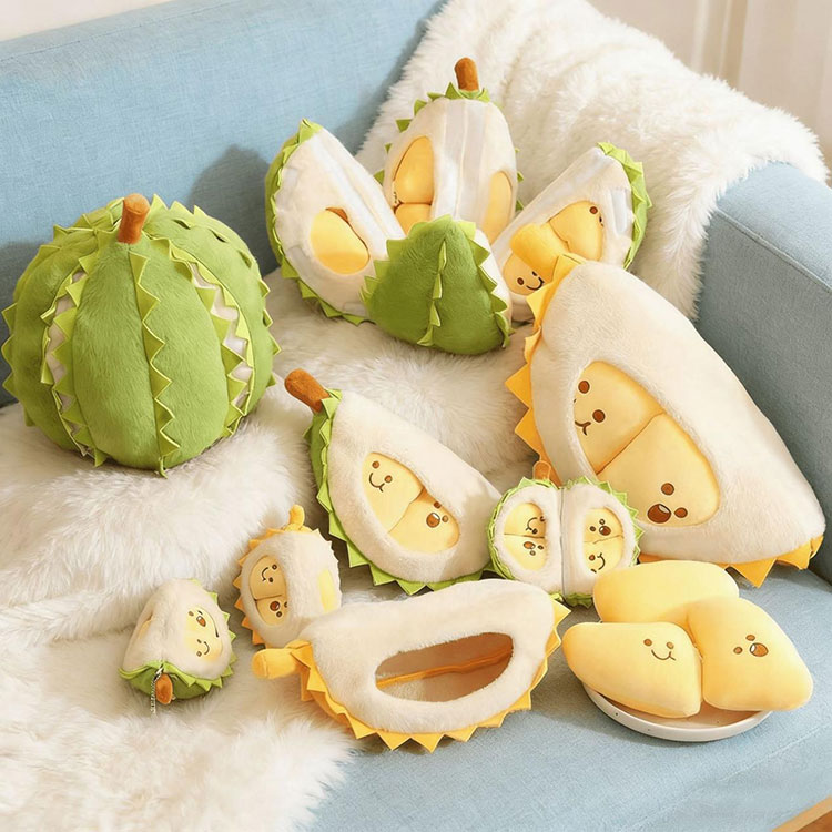 Oreiller en peluche Durian ouvert et fendu